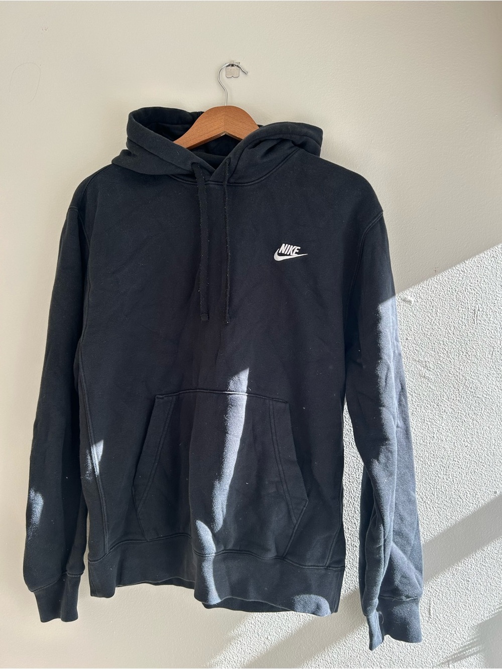 Nike Black Hoodie with White Swoosh Logo